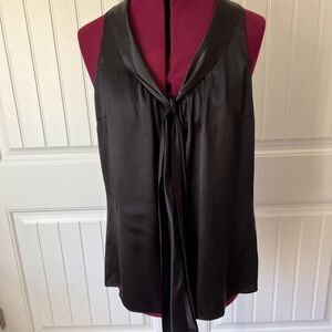 Sleeveless satin top with attached sash.